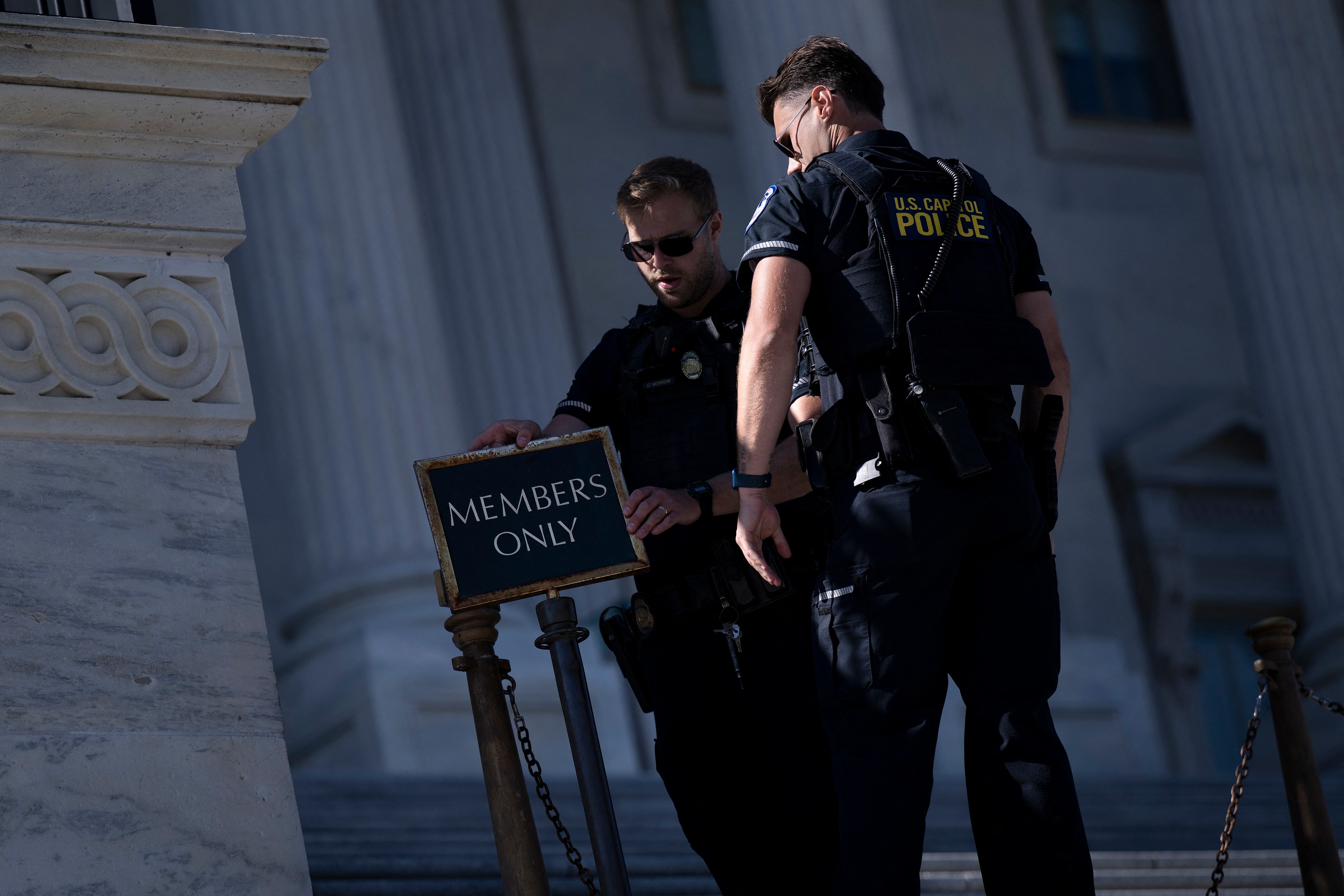 U.S. Capitol Police close an entrance to the Capitol as the federal government continued its shutdown on Oct. 9. Because of the shutdown, officers missed their first full paycheck Oct. 10.